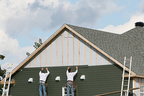 Professional Siding Installation technician working in Sparta, TN